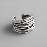 Bague ajustable argentée superposée