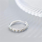 Bague ajustable argentée avec marguerite