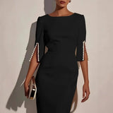 Robe Élégante à Manches Fendues Ornées de Perles