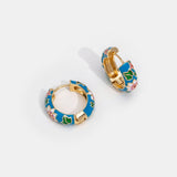 Boucles d'oreilles cercle doré avec fleur