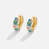 Boucles d'oreilles cercle doré avec fleur
